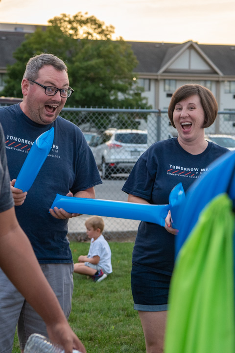 Adam J. and Sarah R. Yoder, alumni and college employees, bring the fun. He's an industrial technology specialist with Workforce Development; she's the coordinator of admissions operations.
