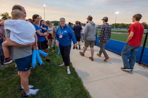 President Gilmour greets coaches and their families (on left) and students (on right). Assistant Director of Athletics Matt J. Blymier, buoyant at the return of Wildcat sports – and Wildcat sports fans – remarked that it had been 649 days since the stands had been filled.