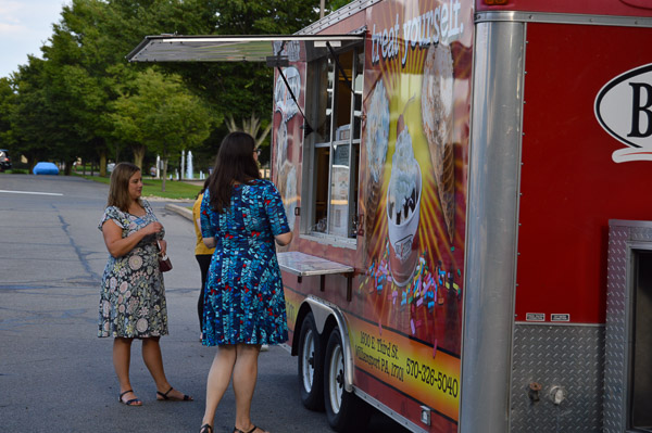 ... a treat that attracted many on a summer evening, including Audriana L. Empet (left) and Jen. M. Cullin-Hetrick from the Admissions Office.