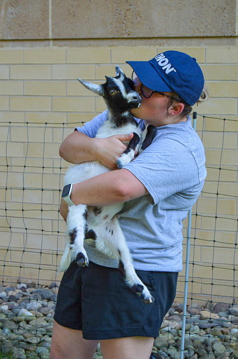 Lauryn A. Stauffer, an automation engineering technology: robotics and automation major from Bath, steals a snuggly smooch.