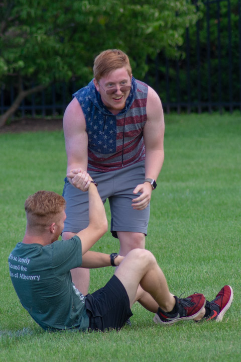 ... and is helped to his feet in most sportsmanlike fashion.