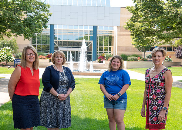 Three female assistant deans for the School of Engineering Technologies at Pennsylvania College of Technology are a source of inspiration for students like Lauryn A. Stauffer (third from left), who is majoring in automation engineering technology: robotics and automation. While women comprise nearly half the labor force, they account for just 27% of STEM workers. From left are: Stacey C. Hampton, industrial and computer technologies; Ellyn A. Lester, construction and architectural technologies; Stauffer; and Kathleen D. Chesmel, materials science and engineering technologies. 