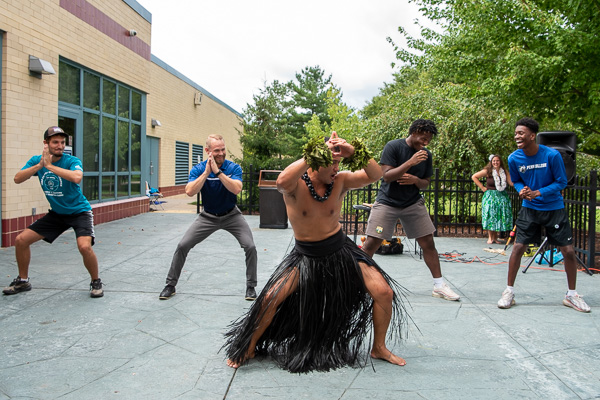 Sharpening their foot-eye coordination at the Multicultural Lawn Party, representatives of the Wildcat basketball team enjoy every second of their off-court workout. 