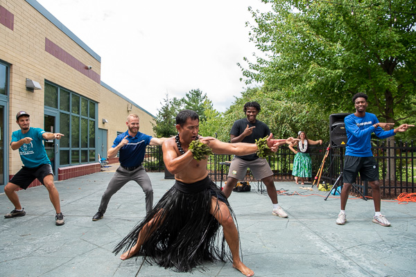 Gamely taking instruction from Mika, from Western Samoa, are (from left) Peyton H. Riley, of Danville; coach Geoff Hensley; David Brown, of Bridgeport, Conn.; and Corey J. Blackwell, of Hammonton, N.J. The student-athletes are all majoring in business management: sport and event management concentration; Mika is affiliated with Pacific Rhythm, a Polynesian entertainment resource based in Warfordsburg. 