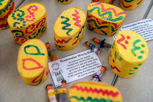 Talismans for the taking: Inside their tiny containers, Guatemalan worry dolls await a call to legendary action.