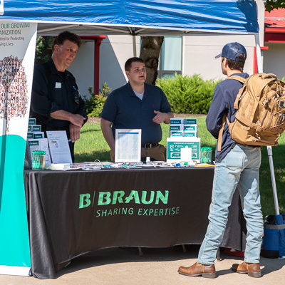 Returning to his alma mater to recruit for B. Braun Medical is Joshua A. Berger (center), a 2020 plastics and polymer engineering technology graduate.