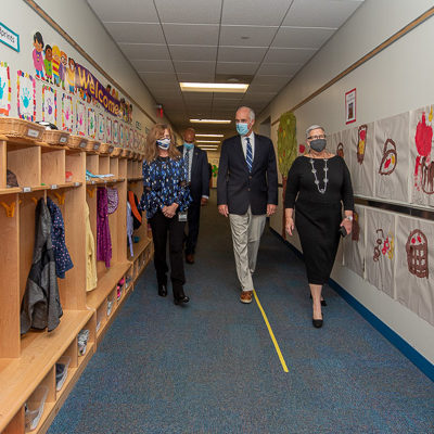 Linda A. Reichert (left), the center's director, and Penn College President Davie Jane Gilmour lead Casey on a tour of the facility.
