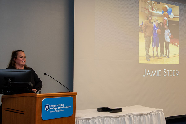 Steer – presented by her sister, Kierstin, a 2018 inductee for basketball, and former coach Matt Wilt – offers remarks at the HOF banquet.