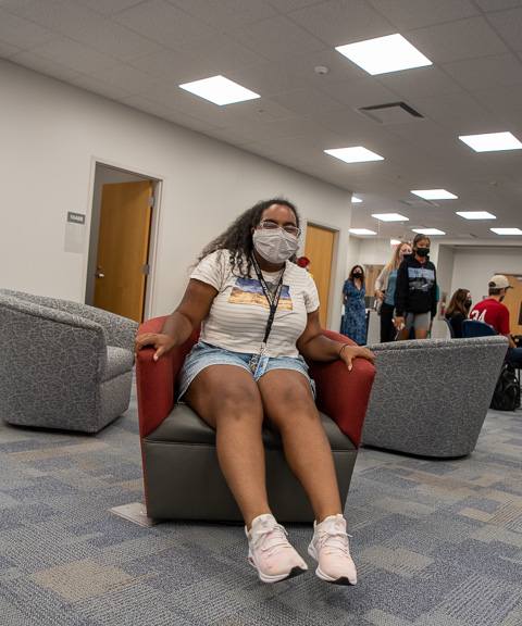 Taking a playful spin in one of the LEAP Center’s swivel chairs is Kayla M. Figuereo, a first-year robotics and automation major from Beverly, N.J.