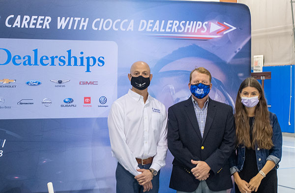 From left, Matt Marchiori, western region service director for Ciocca Dealerships; Chris S. Macdonald, assistant director of corporate relations at Pennsylvania College of Technology, and Stephanie Maher, career development manager for Ciocca, gather for a recruitment day activity at the college and to commemorate a student scholarship established by the company.