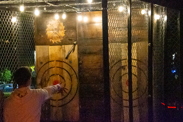 Adding to a diverting menu, The Hatchet House brings its portable ax-throwing unit to campus.