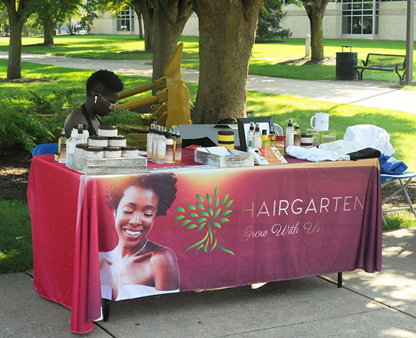 Among those stationed along Saturday's Vendors Row is Una Rawls, founder of HairGarten, who delivered a program in Penn's Inn the evening before.