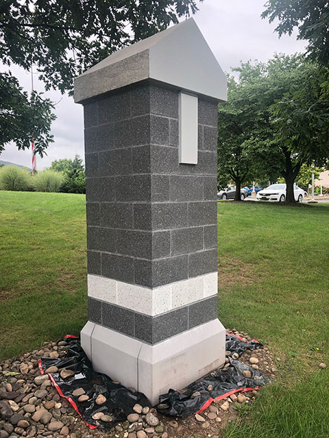 The first repaired and refinished pillar, on the northeast corner of campus, provides a template for the dozens to follow.
