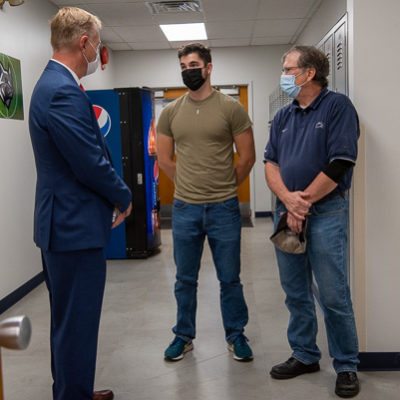 Keller holds a serendipitous meeting with two electrical construction students – Brady J. Dible (center), of Milroy, a member of the Air National Guard, and Craig A. Seasholtz, of Avis – who expressed gratitude for his support of veterans, as well as the constituent service his office provided in response to recent requests.
