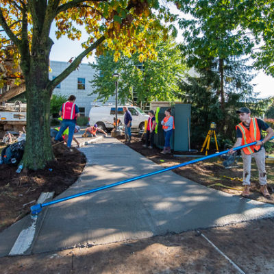 With an eye toward snow removal, even on a sunny fall day, concrete science widen and improve an SASC sidewalk.