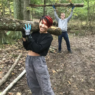 Alicia Martinez, an aviation maintenance technology major from Allentown, and Austin W. Clement, of Harrisburg, enrolled in information technology: network specialist concentration, do some heavy lifting along the nature trail. Clement is part of the Information Security Association at Penn College, one of a number of student organizations whose members signed on for "(community) Service Saturday." Other participants included representatives from Baja SAE, the Emergency Management Club, the Horticulture Technicians’ Association – National Association of Landscape Professionals Student Chapter, the Institute of Electronics & Electrical Engineers, the Physician Assistant Club, and United Campus Ministry.