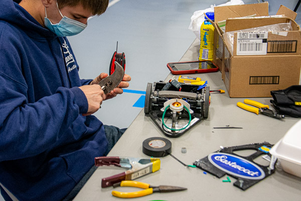 Stocked with an arsenal of tools – including pliers, tape and fortitude – Austin N. Deibert, of Slatington, works on his robot. A SWORD member, he is enrolled in the four-year automation engineering technology: robotics & automation major.