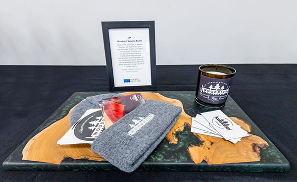 Raffaele M. Colone, owner of Woodrich and a 2000 graduate in forest technology, donated this handcrafted serving board. 