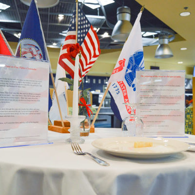 Empty tables hold reminders of those who answered the call and paid the ultimate price.