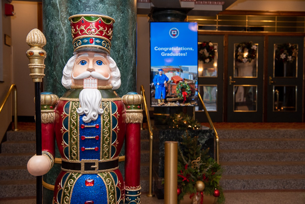 The outer lobby of the Community Arts Center welcomes guests with festive décor. 