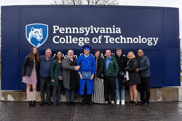 Huddled for warmth is the family of Axel D. Cluck, who graduated in landscape/horticulture technology: landscape emphasis and was a co-recipient of the Horticulture Faculty Award.
