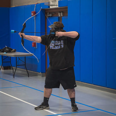 Kellor A. Schooley, an event assistant (and network administration and engineering technology student), sets his sights.