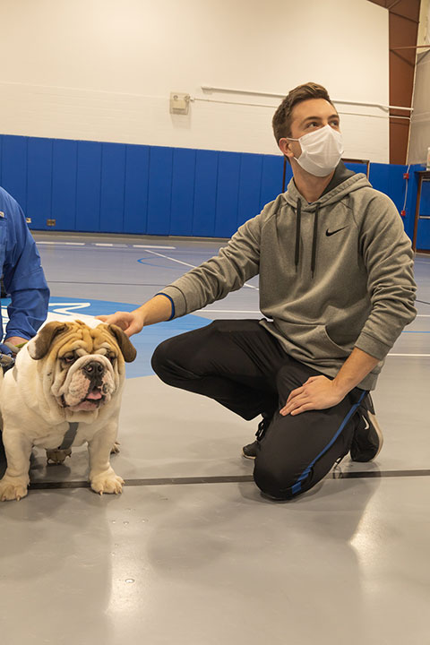 Eric L. Anstadt, electrical technologies and occupations instructor, introduced students to English bulldogs Groucho and Meatball.