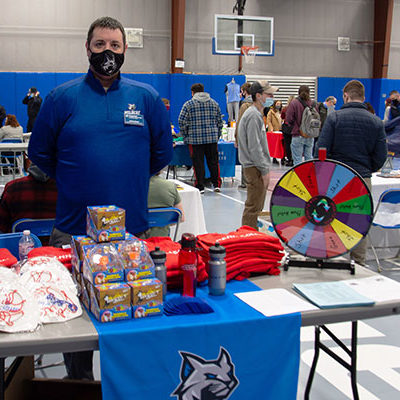 In addition to familiarizing students with intramurals and other extracurricular athletic pursuits, Jeremy R. Bottorf, coordinator of campus recreation, let visitors spin the wheel for swag.