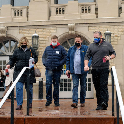 As the crowd broke into major-specific areas of interest, representatives of the college's three academic schools – including Brian D. Walton (right), assistant dean of business and hospitality – were on hand to get attendees to their next stop.