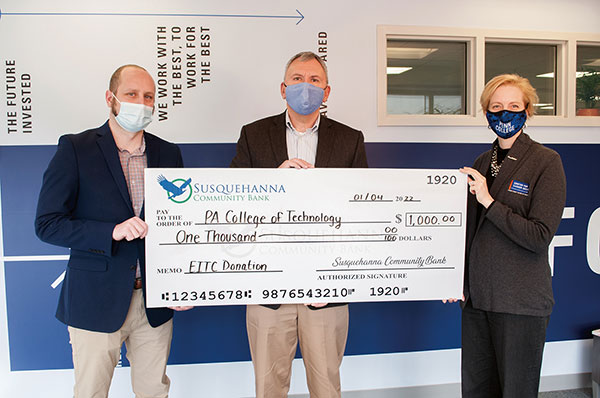 Commemorating Susquehanna Community Bank’s Educational Improvement Tax Credit Program donation to the Pennsylvania College of Technology are, from left, Kyle A. Smith, executive director of college relations and the Penn College Foundation; Michael Loeh, assistant vice president/commercial relationship manager for Susquehanna Community Bank; and Elizabeth A. Biddle, director of corporate relations for Penn College.