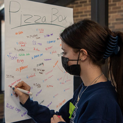 “Thinking outside the box,” the ninth graders began their campus visit in the Thompson Professional Development Center, brainstorming various alternate uses for a pizza box. 