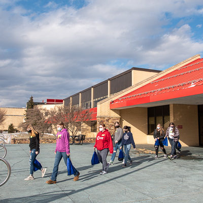 Blue skies and sunshine greet the young visitors as they make their way on campus.