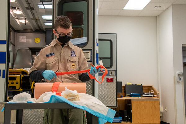 A Scout quickly gains helpful hands-on experience in the college’s well-equipped Paramedic Lab.