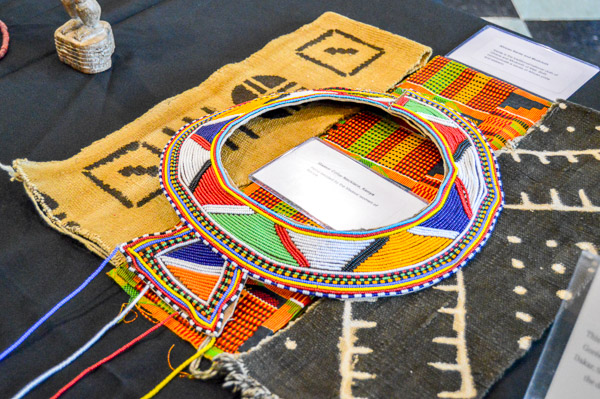 A vibrant collar necklace, handbeaded by the Maasai women of Kenya