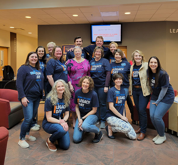 The president is surrounded by College Relations staff, the driving force behind Legacy Day.
