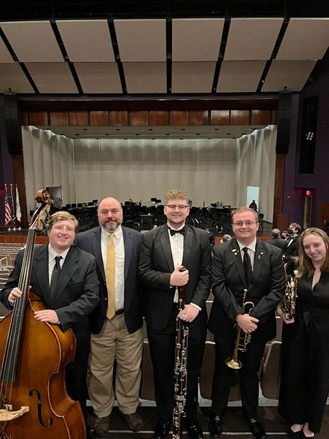 Geffre (left) joins his Lycoming College colleagues.
