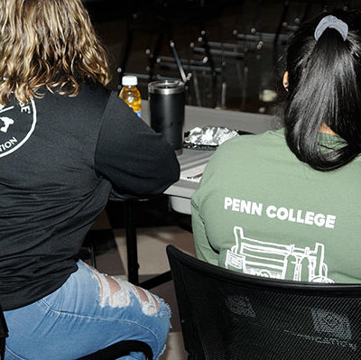 Stauffer and Ybarra, both of whom were interviewed by the Williamsport Sun-Gazette after the event, make their allegiance clear with sweatshirts espousing the college's Women in Construction and Welding and Fabrication.