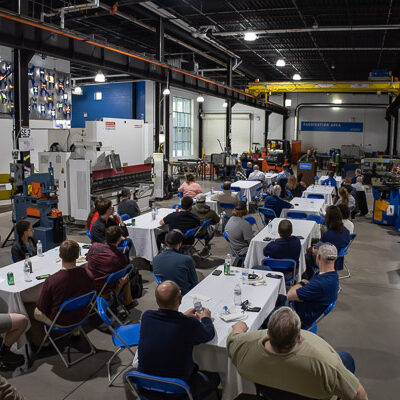A welding lab does double-duty as a meal venue, offering diners immersion in a well-equipped learning environment.