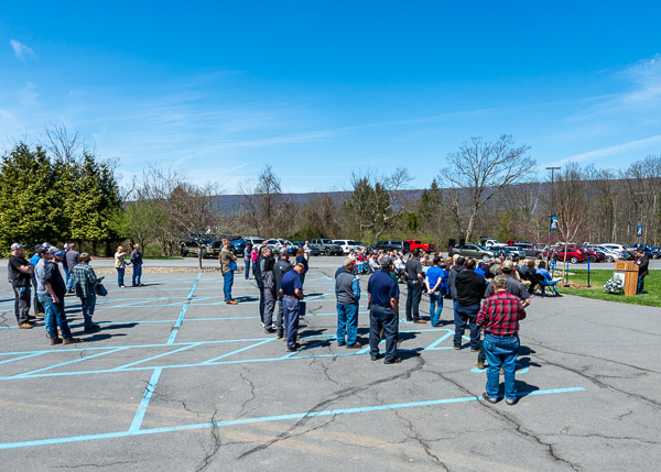 Current students, employees and alumni – some of whom returned to Penn College after graduation as faculty and staff – gather in the parking lot for the day's festivities.