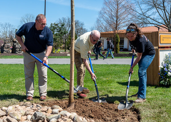 With a continuity of purpose that spans the decades, Horticulture Club alumni take shovels in hand. From left are Bower, who holds three Penn College degrees and serves as the club's faculty adviser; Pete Gardner, the club's first president; and Faith E. Mitchell, of Sunbury, its current president.