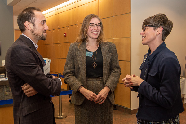 Becky J. Shaner (right), senior manager of donor relations and special events, talks with alumnus Ryan Monteleone, who joined the Heritage Society, and College Relations Student Assistant Sydney M Telesky, whose gratitude was impressively expressed in the video shown to donors.