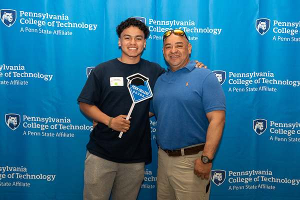 Penn College Bound! Celian E. Medina and his father make a memory. Medina, from Hackettstown, N.J., is interested in construction management. The family was one of a dozen to attend from out of state.
