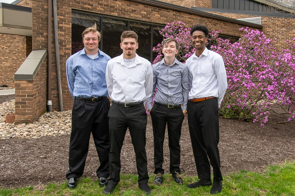 The brains behind this year’s Professional Coffee & Conversation (from left): Andrew M. Snyder, Jacob R. Wagner, Alicia M. Wyland and Corey J. Blackwell. All four are majoring in business administration: sport & event management.