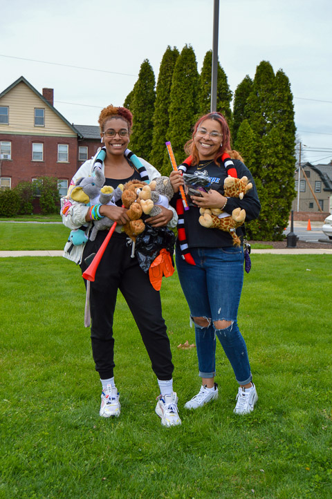 Toting an evening's worth of fun are sisters Ja’Quela (left) and Jonice Dyer, of Dover, Del., both enrolled in business administration.