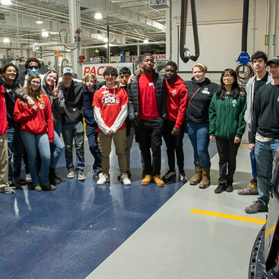 Visitors from Dauphin County Technical School, in Harrisburg, conclude a tour of the Collision Repair Lab with a group photo.