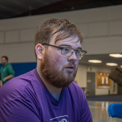 WOGA's Zack T. Thompson is a picture of concentration at the club's event. Thompson, of Hustontown, is enrolled in software development and information management.