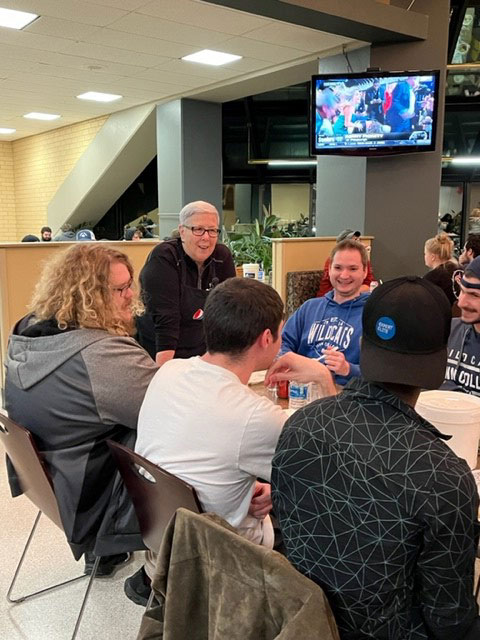During a Penn College tradition that began contemporaneous with her presidency, Davie Jane Gilmour enjoys one of her favorite activities: talking with students.