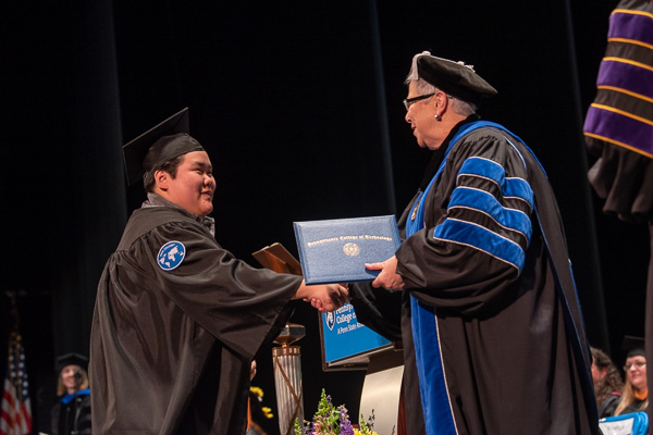 Madison Yang Cooper, recipient of the Hospitality Faculty Award, graduates in applied management and culinary arts technology.