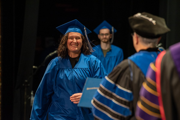 On the right path is Morgan Stephenie Wood, an associate-degree graduate in collision repair technology. She will remain in college, pursuing a bachelor's in automotive technology management.