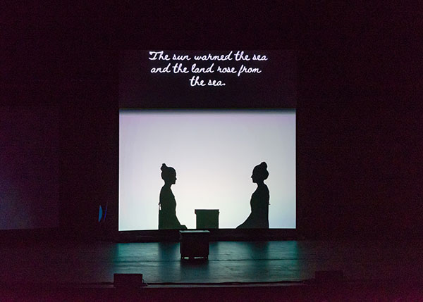 In a production that heightens its illusions with digital media, 